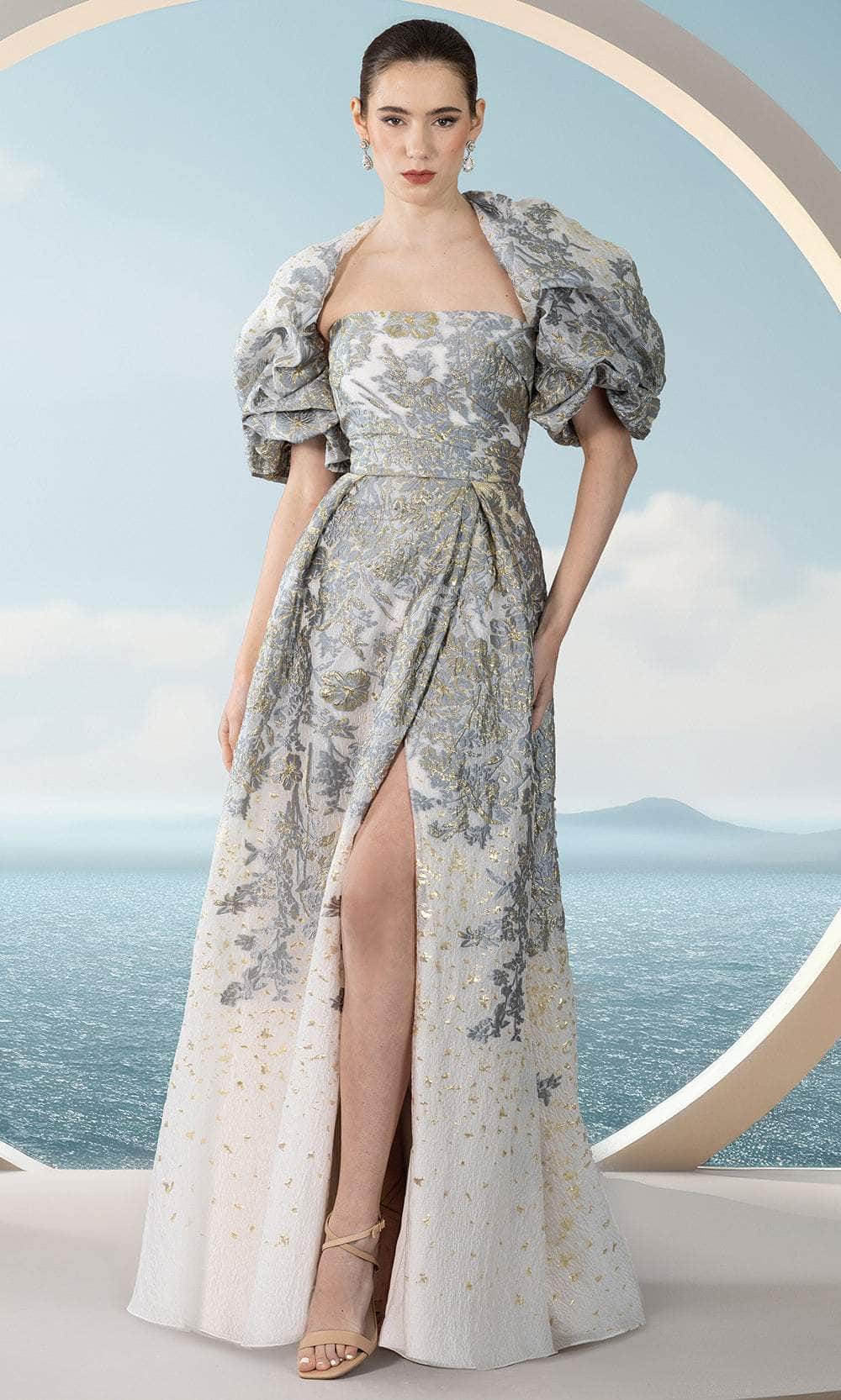 Janique 351018 - Long A-Line Dress - Strapless, Pleated Accent, Metallic Details, Midrise Open Back, Zipper Closure, High Slit, Sweep Train, Ruffle Sleeve Bolero Couture Candy Janique 351018 - Long A-Line Dress - Strapless, Pleated Accent, Metallic Details, Midrise Open Back, Zipper Closure, High Slit, Sweep Train, Ruffle Sleeve Bolero Couture Candy
