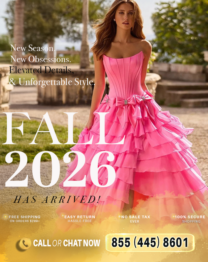 A woman wearing a bright pink strapless tiered gown stands outdoors in a garden setting, with large promotional text reading 'FALL 2026 HAS ARRIVED!' and a phone number at the bottom.